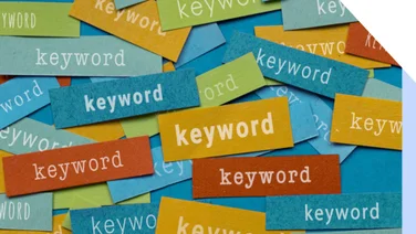 Snippets of colored paper with the word "keyword" written on them