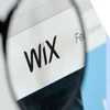 Wix logo under a magnifying glass