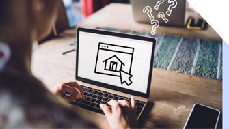 A person types on a laptop, displaying a home icon on the screen, surrounded by question marks, suggesting confusion or inquiry.