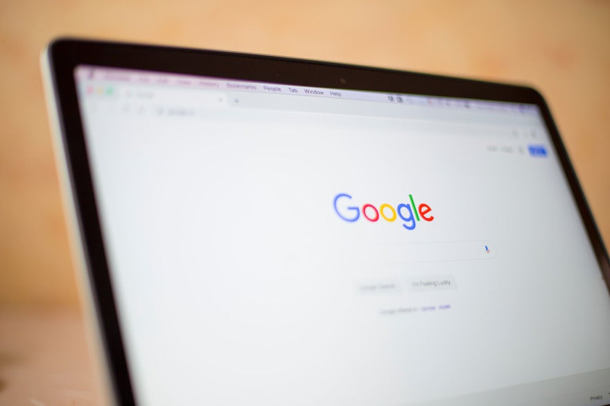 Laptop screen showing Google homepage