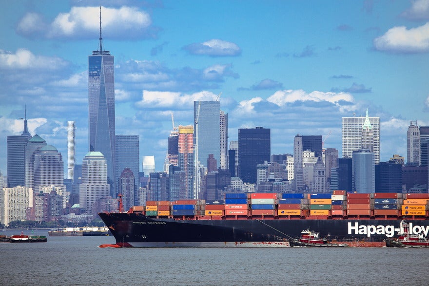 Trump ends de minimis tariff exemption Container ship in New York City