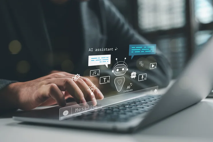 AI website tools floating above a laptop