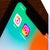 Close-up of a smartphone screen displaying the Instagram and Reels app icons against a gradient background