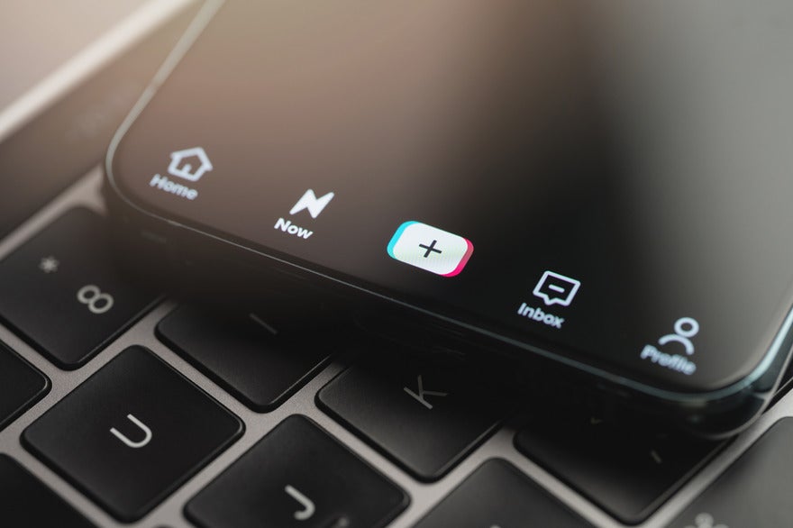 TikTok Chat Tools Intro bottom of iphone screen on TikTok app, showing the home, create, inbox, and profile tabs