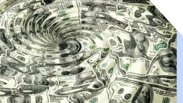 US dollars distorted by a water whirlpool