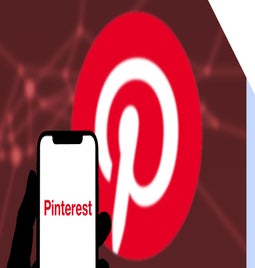 A hand holds a smartphone displaying the Pinterest logo, set against a blurred, red-backgrounded Pinterest symbol.