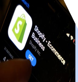 Shopify app page on a phone app store
