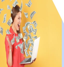 A person in a red shirt holds a laptop, surrounded by floating hundred-dollar bills against a bright yellow background.