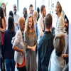 Group of people mingling and networking at an event