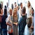 Group of people mingling and networking at an event