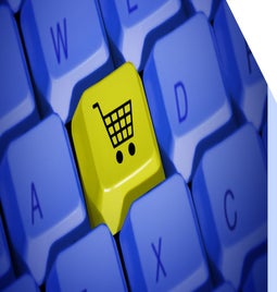 Keyboard buttons with a shopping cart button in yellow sitting replacing a letter button