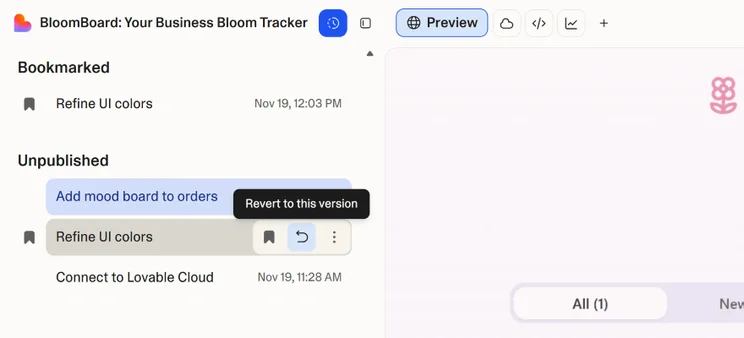 Screenshot of a version history tab on Lovable with the option to bookmark or revert to a past version of an app.