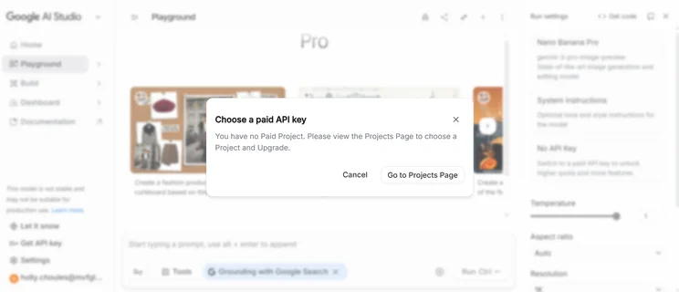 Popup message on Google AI Studio indicating no paid API key is available, with options to cancel or go to the Projects Page.