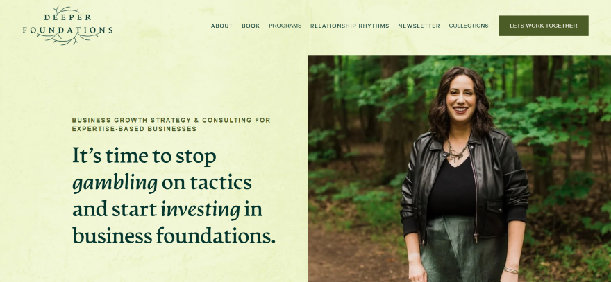 A person stands in a forest setting, wearing a black leather jacket and a long skirt, promoting business growth strategy and consulting.