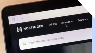 Hostinger homepage on laptop